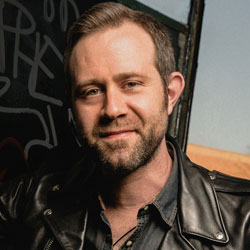 headshot of Adam Ritchie