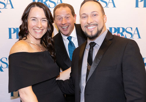 three AnvilAward attendees at step and repeatwith PRSA logo