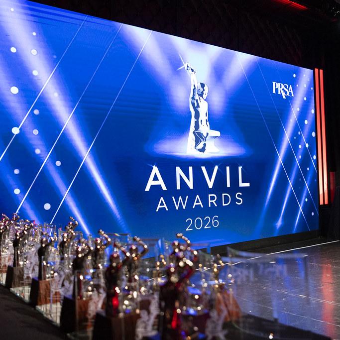 Closeup of award statues with the stage backdrop