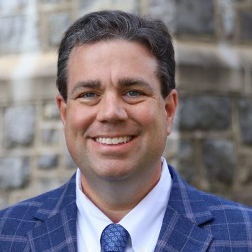 headshot of Cayce Myers