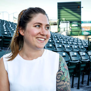 head shot of Emma Finkbeiner standing in baseball stadium