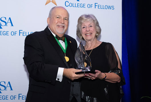 College of Fellows Chair Philip Poole and Sage Award honoree Geri Evans College of Fellows Chair Philip Poole and Sage Award honoree Geri Evans