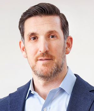 headshot of Andrew Healy