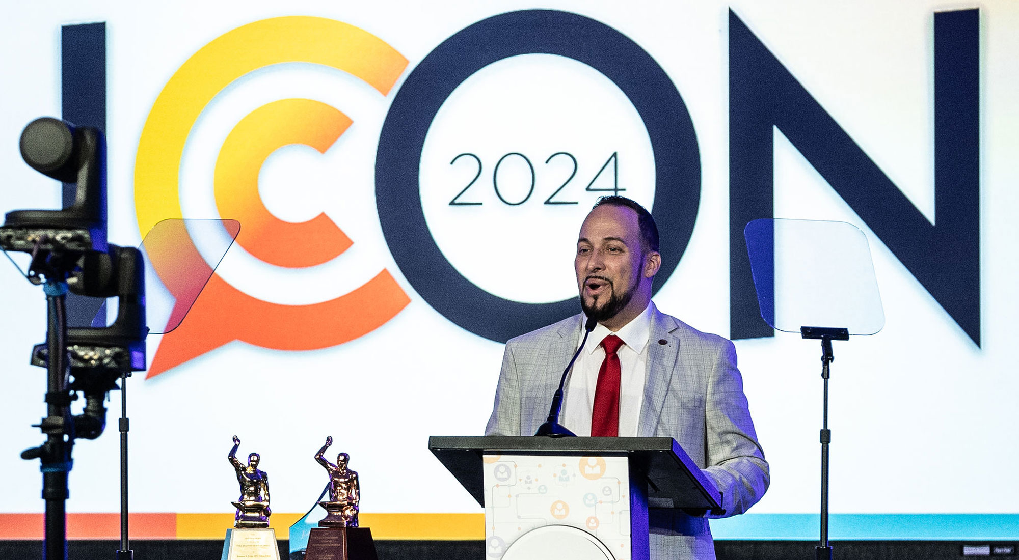 Joseph Abreu at podium in front of ICON banner Joseph Abreu at podium in front of ICON banner