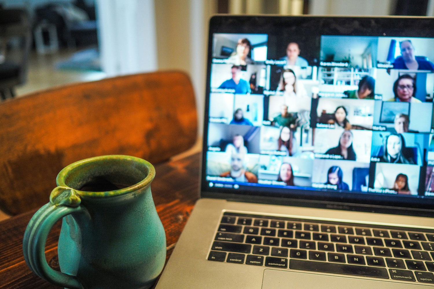 laptop displaying group of people