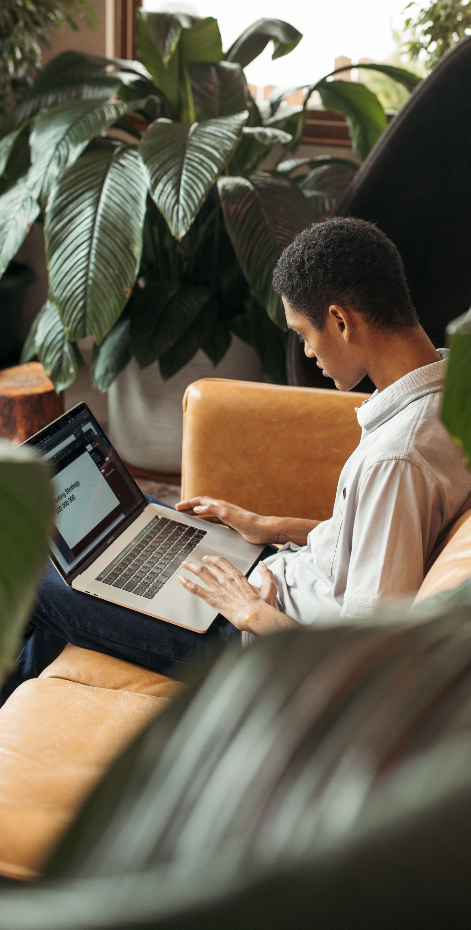 young man with laptop