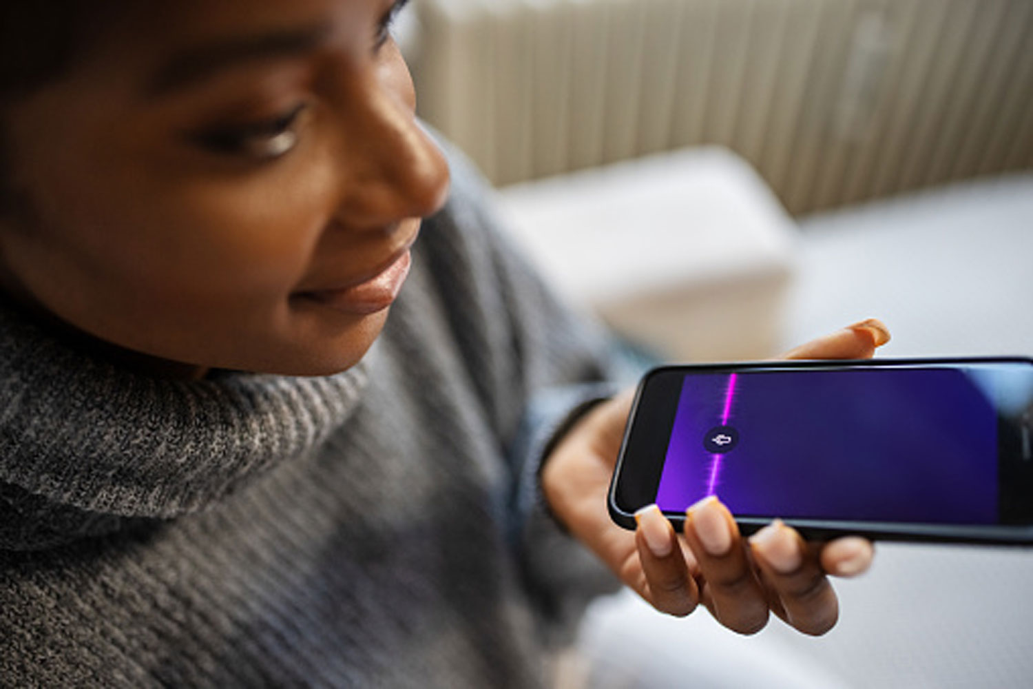 woman holding smartphone