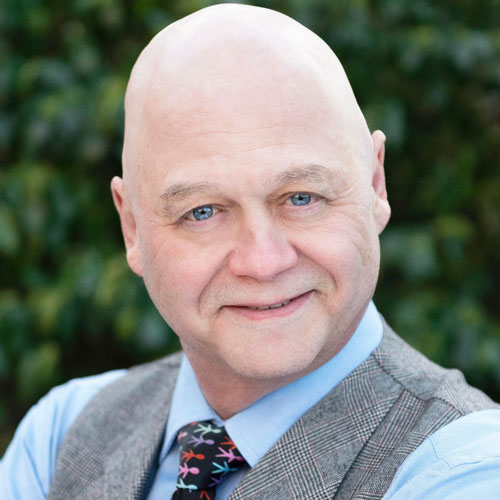 headshot of Fred Helio