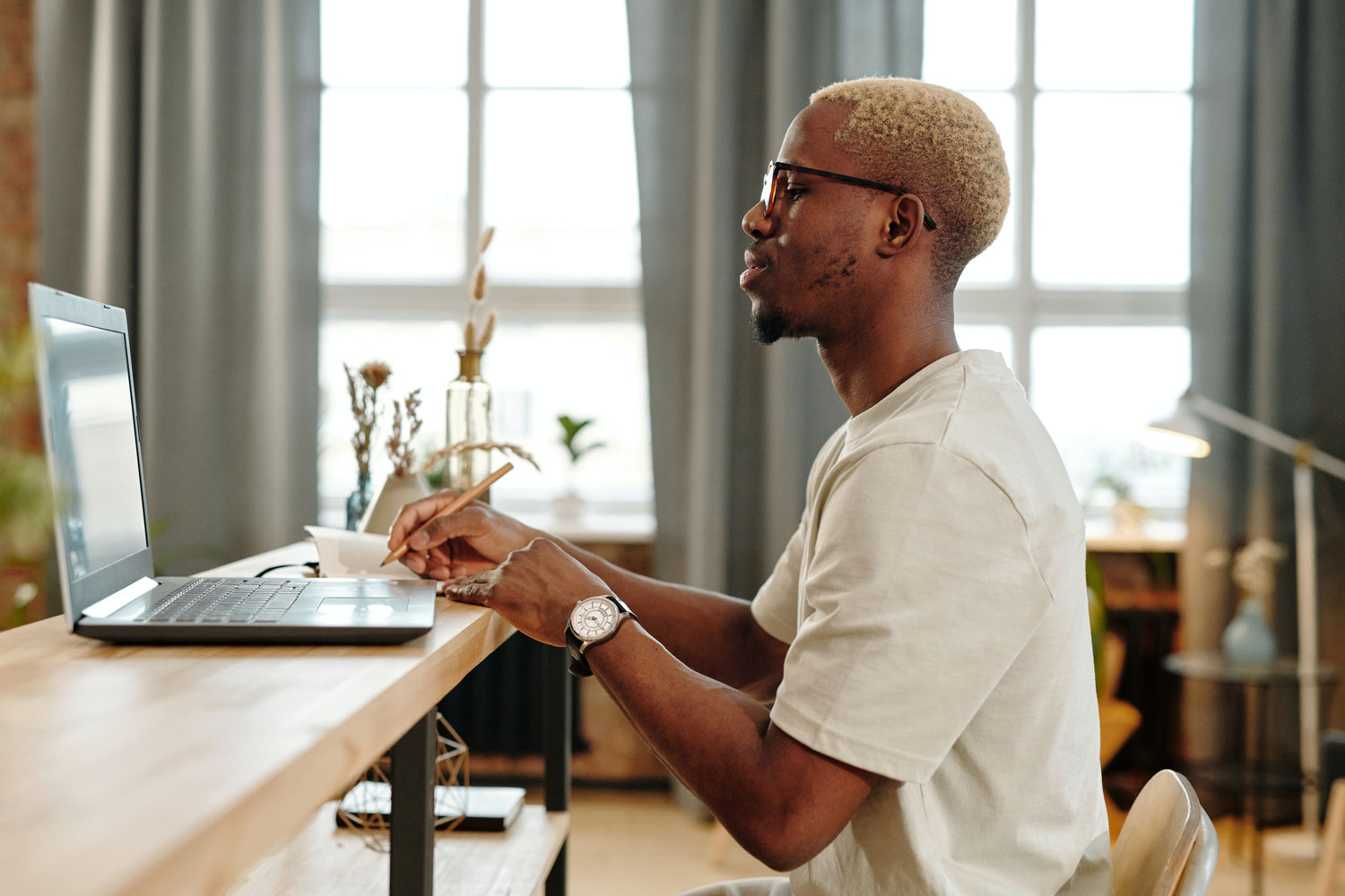 young man using laptop