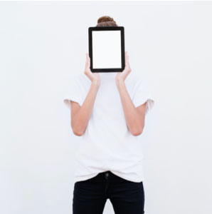 person holding tablet covering their face