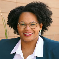 headshot of Adena White headshot of Adena White
