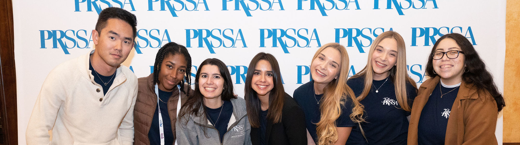 Six PRSSA students in front of window