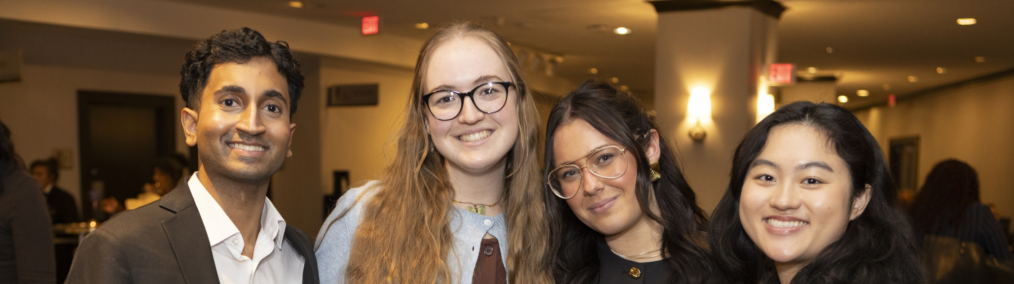 Six PRSSA students in front of window