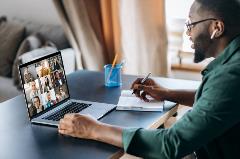 Student at laptop on a video call